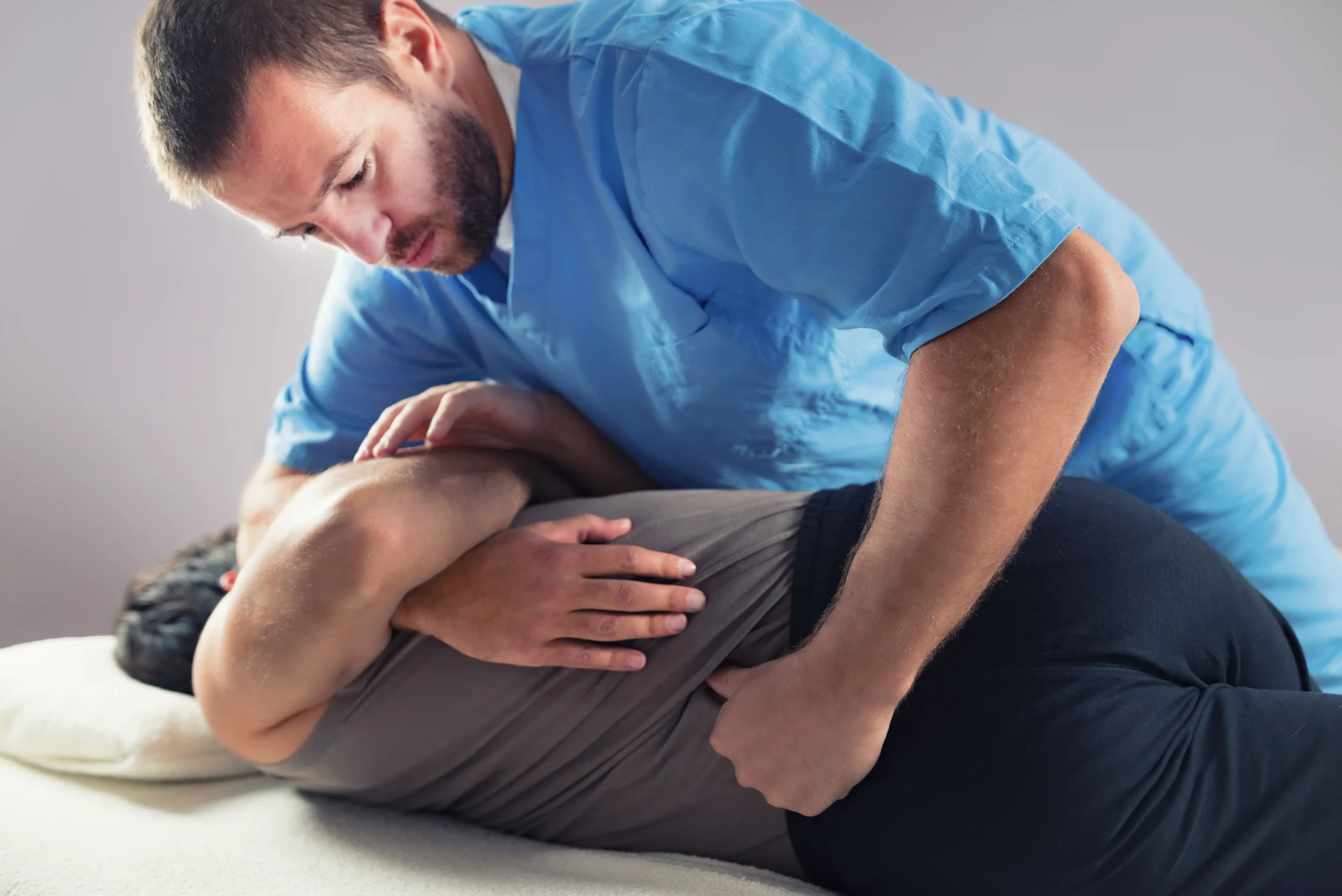 Chapin, SC chiropractor performing a chiropractic adjustment on a patient.